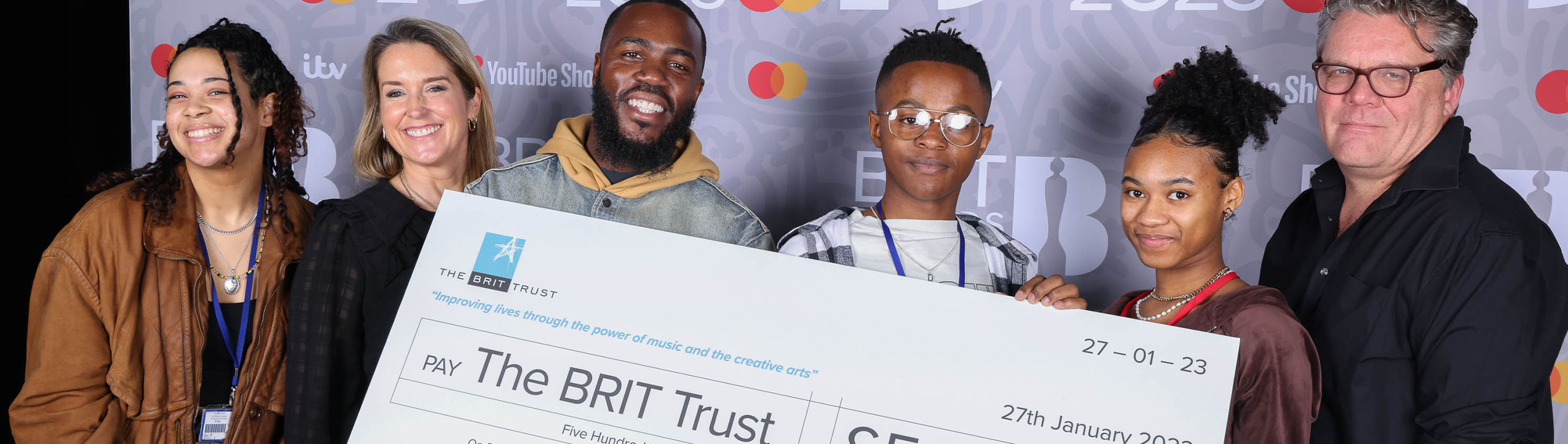 Mo Gilligan visits The BRIT School ahead of hosting The BRIT Awards 2023 with Mastercard