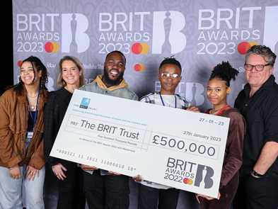 Mo Gilligan visits The BRIT School ahead of hosting The BRIT Awards 2023 with Mastercard